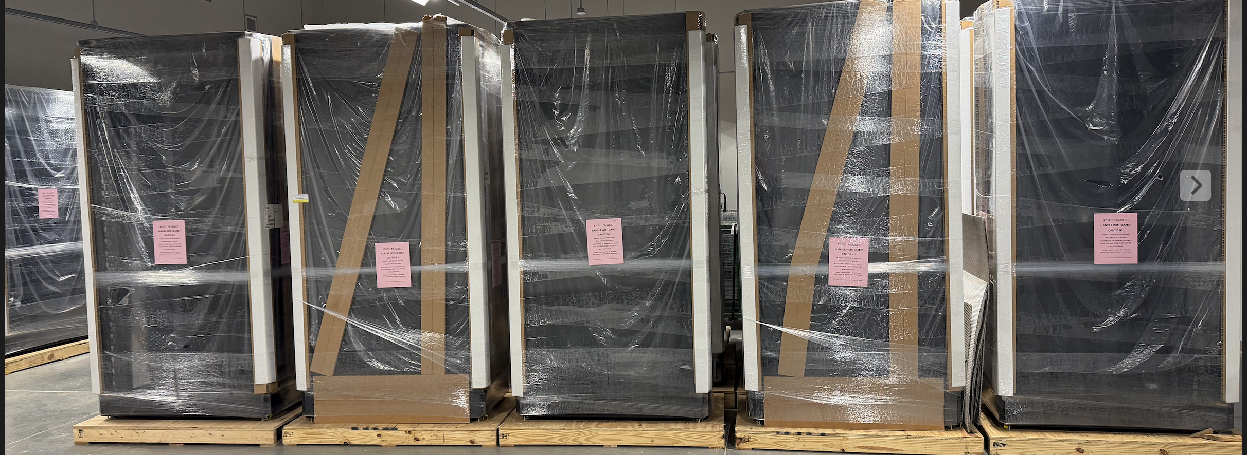 48 Legrand 52U network server cabinets model 138295A on pallets - factory sealed black data center racks for bulk sale in Ashburn Virginia